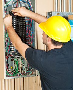 electrical repairs electrician in Newnan GA working on electrical panel